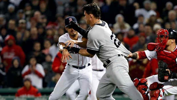 Boston Red Sox reliever Joe Kelly; New York Yankees utility man Tyler Austin